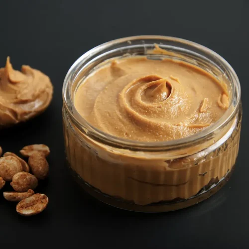 Homemade Peanut Butter On A Clear Glass