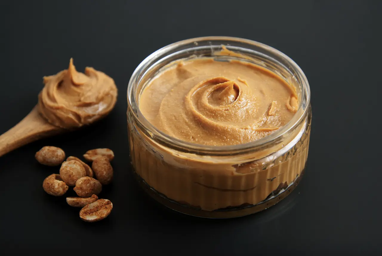 Homemade Peanut Butter On A Clear Glass